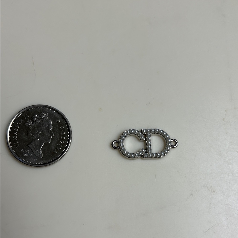 AuthenticElegant Silver CD Christian Dior Charm